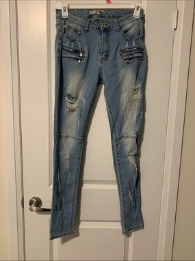 Women's Light Blue Distressed Skinny Jeans with Zip Pocket Detail